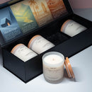 Coffret Matsuri de bougies parfumées artisanales suisses Sakura, contenant quatre bougies en verre blanc mat avec couvercles en bois, présenté ouvert avec les descriptifs des parfums.